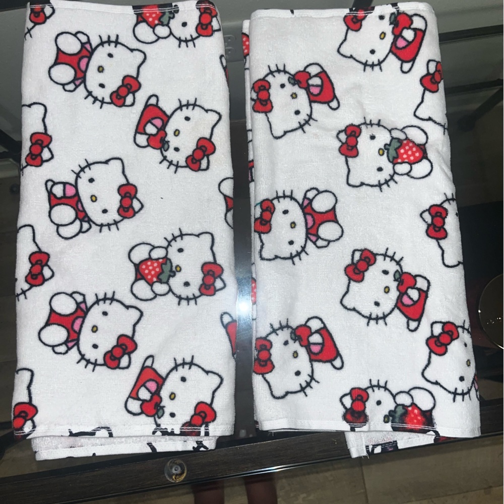 Two hello kitty bath towels